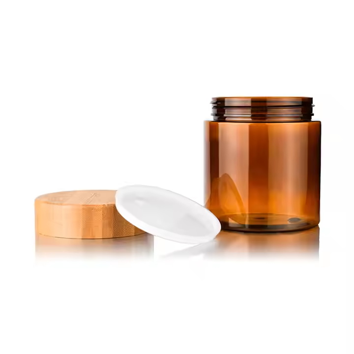 Pot de cr&egrave;me en plastique PET ambr&eacute; avec couvercle en bambou