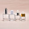 เครื่องสำอางที่ว่างเปล่า 1oz 2oz 30ml 60ml Skincare น้ำหอมเซรั่มน้ำมันหอมระเหยผม Dropper แก้วขวด