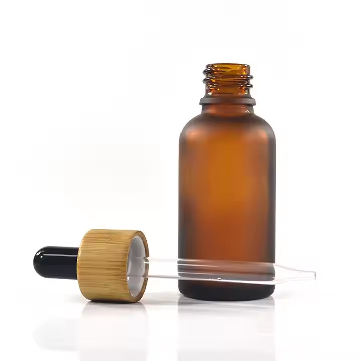 Tropfflasche aus Glas f&uuml;r &auml;therische &Ouml;le mit Bambusdeckel
